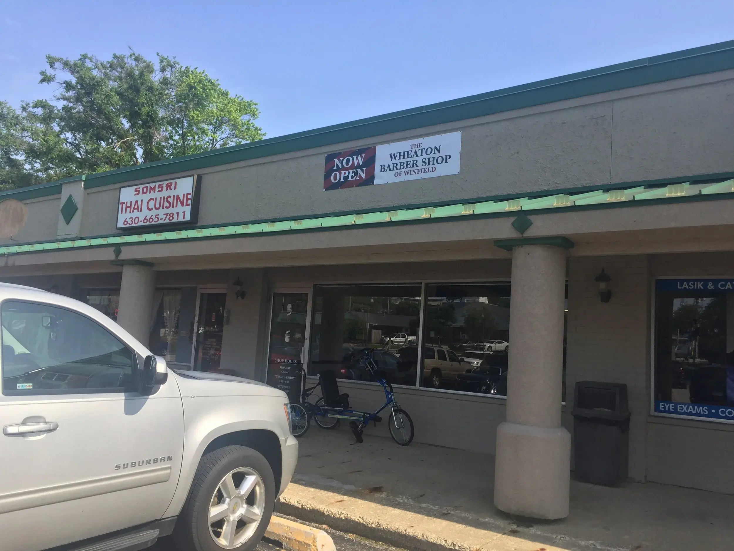 Exterior of the Wheaton Barber Shop location in Winfield IL