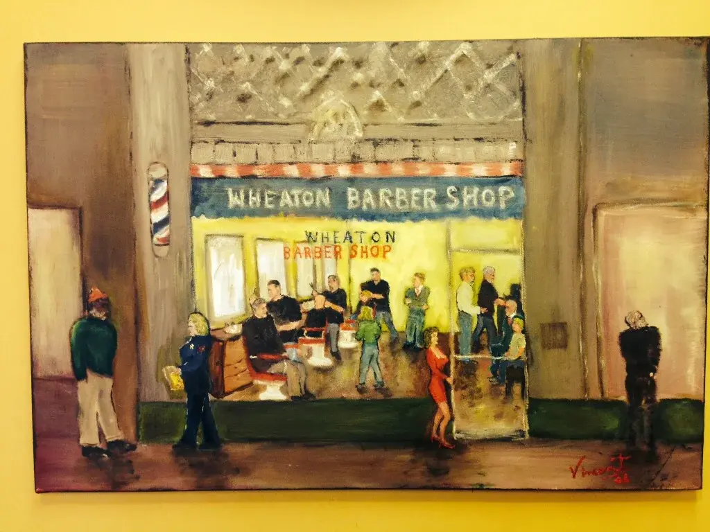 Custom painting of the Wheaton Barber Shop storefront on display